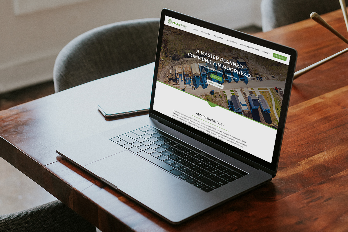 Prairie PKWY website mocked up on a laptop
